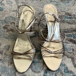 Calvin Klein, metallic, strappy wedge sandals. Size 10